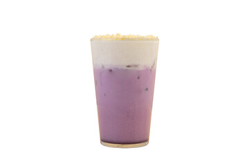 Blueberry milkshake with whipped cream in a glass on yellow background