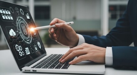 Person using a stylus on a laptop with digital interface and icons displayed on the screen view close up