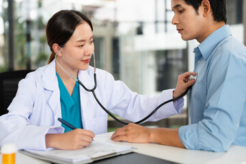 Consultation, patient and doctor in office with stethoscope, checkup and healthcare at clinic....