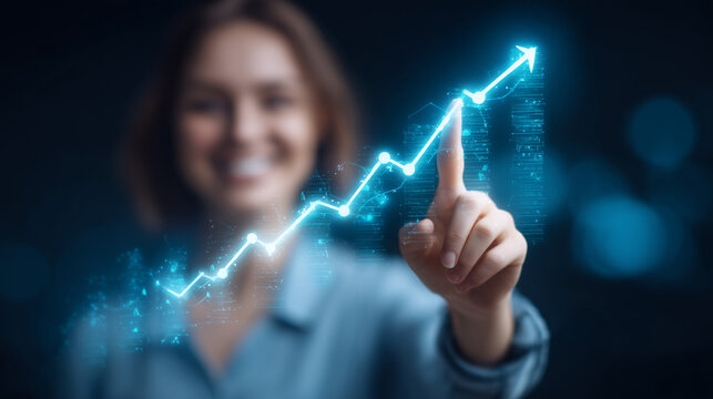 A businesswoman smiling and pointing at a stock market graph on a digital screen, a trading chart going up, a light background with copy space
