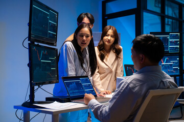 group of Happy young asian business people chatting happily after a night of overtime work in the office.Supervisor chats with employees after working together planning success strategy enjoy teamwork