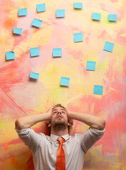 Busy businessman under deadline. Busy deadline concept. Busy employee facing urgent tasks. Stressed but determined. Startup deadline chaos. Busy worker. Deadline panic.