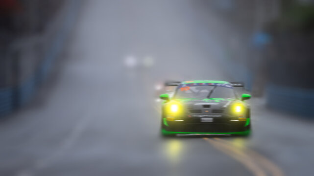 Motion blur race car racing on speed track, Motion blurred super car race on street track circuit, Automobile automotive transportation vehicle background,