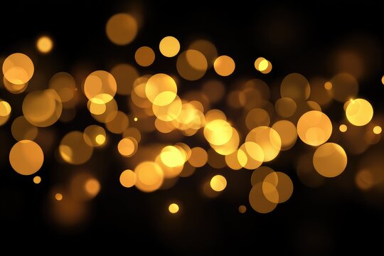 Golden bokeh lights on a black background