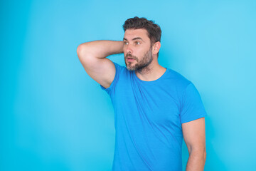 Man with hand on chin thinking about question, pensive expression. Thoughtful male face. Doubt...