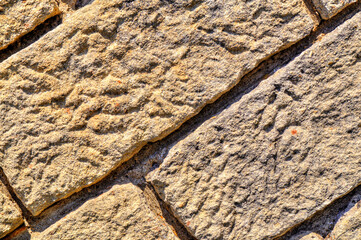 Colorful stone wall background close up view
