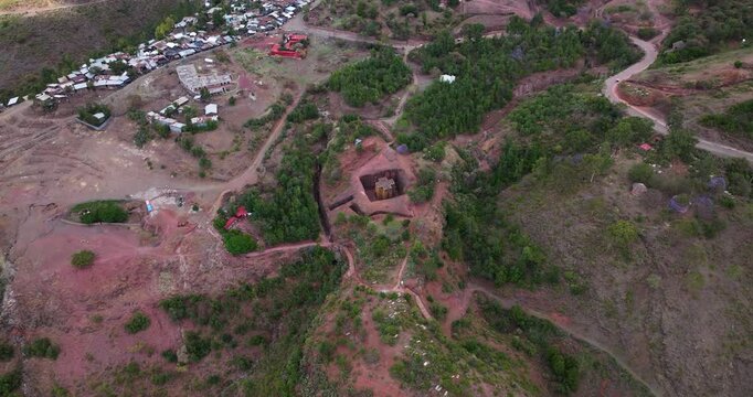 Above View Of The Eleven Rock-Hewn Monolithic Churches. Church of St. George In Lalibela, Ethiopia. Aerial Shot