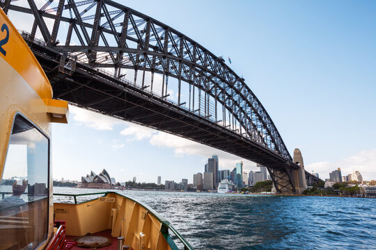 Harbour bridge and city of Sydney from ferry boat, Australia