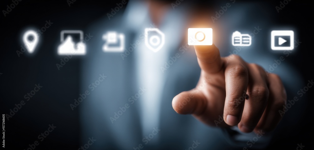 Poster man in a suit interacting with futuristic digital icons representing technology, communication, and 