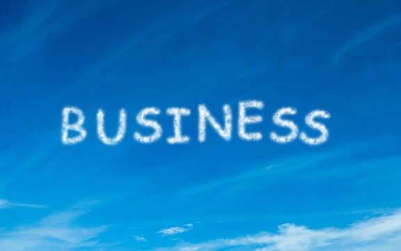 Fototapeta Business written in white in sky