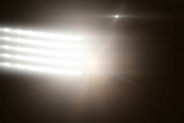 Flat design graphic is showing grid of stadium floodlight panels creating lens flare and haze