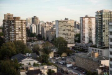 Fototapeta premium Blurry view of cityscape during summer