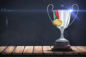 Close up of trophy with gold medals