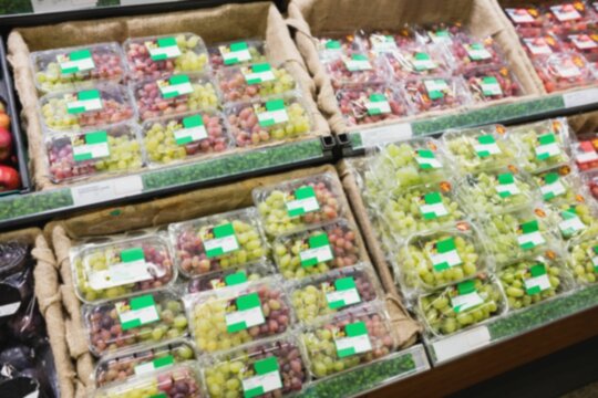 Boxes of fruits in supermarket