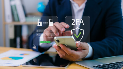 Person using smartphone to access digital interface with 2FA login screen and security icons,...