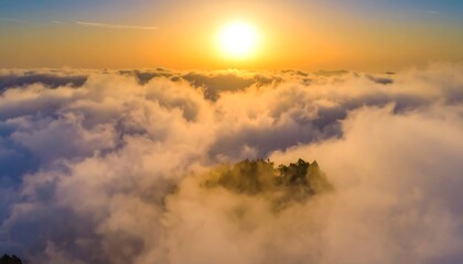 Sunrise above a sea of clouds