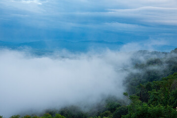 Beautiful Mountain landscape foggy windy mountain range green landscape asian farm. Amazing Landscape mountain green field meadow white cloud blue sky on sunrise. Countryside sunlight heaven scenery