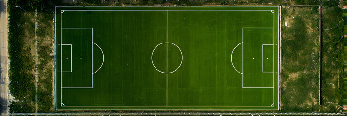 Aerial view of empty football field. Green grass texture with white lines marking pitch. Top down view of soccer field. Soccer game playground for sport. Competition field for match. Championship
