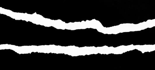 Ripped torn paper edges isolated on black background with clipping path, space for copy. Space for advertising copy. Paper for message notes, for graphic design and banner background.