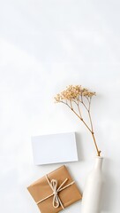 minimalist gift wrapping with dried flower.