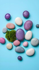 Colorful pebble stone with moss