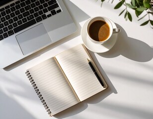 Top view of a minimalist desk with laptop, notebook, pen, and coffee cup, even soft daylight, flat lay composition