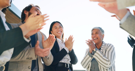 Applause, outdoor and business people with celebration, good news and achievement in collaboration....