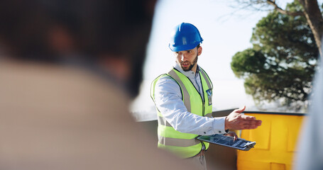 Engineer, man and clipboard for solar power at construction site with business people, point and...