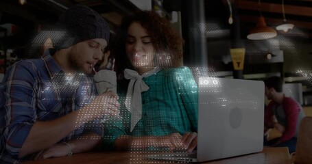 Friends tapping laptop trackpad and sharing drink for tech demo as digital code overlay intensifies - Powered by Adobe