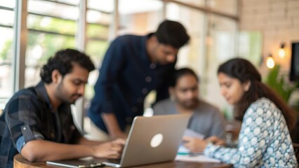 Collaborative Indian startup team working on innovative technology solutions	
