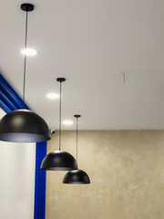 Ceiling lighting lamps hanging in modern cafe.