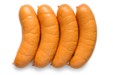 A row of fresh meat sausages on a white background. Four thick sausages close-up.