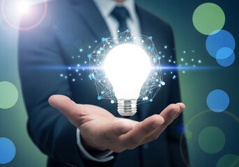 Businessman holding a glowing light bulb connected to a digital network