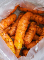 Close-up of some turmeric in plastic