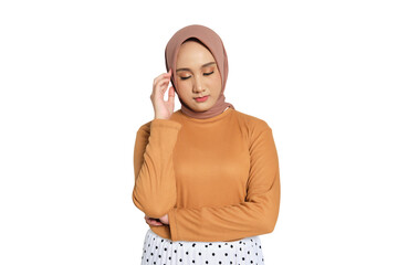 Muslim woman in hijab closing eyes and touching head with hand as if having headache isolated on...