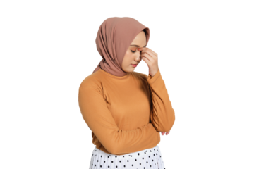 Muslim woman in hijab closing eyes and touching head with hand as if having headache isolated on transparent background
