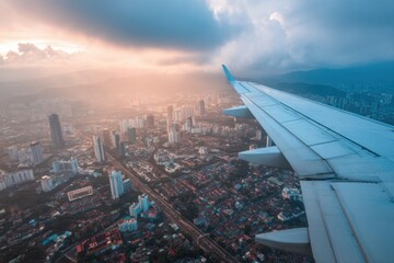 Aerial View of Cityscape at Sunset from Airplane Window Wing