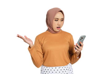 Shocked young Muslim woman in hijab looking at smartphone with confused expression isolated on transparent background