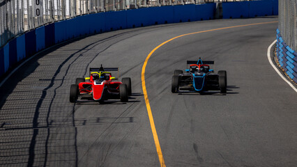 Motion blur race car racing on speed track, Motion blurred super car race on street track circuit,...