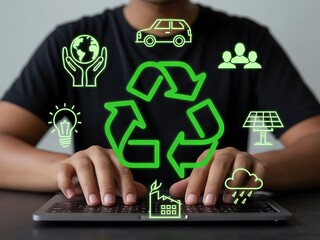 Person interacting with environmental icons on a laptop recycling