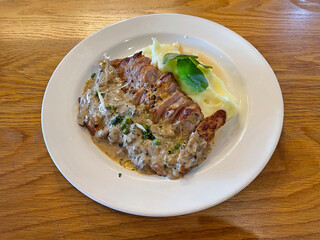 Pork steak with mashed potato 