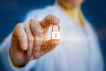 A hand reaches for a digital lock, symbolizing cybersecurity and data protection