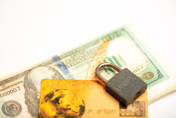 Paper currency dollar credit card and lock isolated on white background