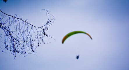 paragliding sport view with a wide sky background