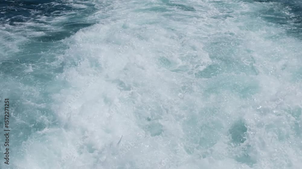 Poster a speedboat navigates through the clear blue waters, sending white waves splashing behind as it move
