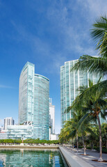 Modern skyline of Miami with towering skyscrapers, tropical vibe, and waterfront views