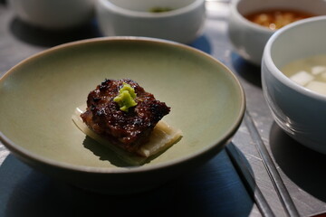 Korean BBQ with Raw Beef Short Ribs Grilled on Charcoal at Local Galbi Restaurant