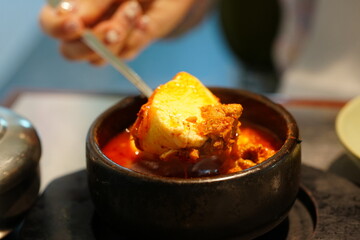 Korean BBQ with Raw Beef Short Ribs Grilled on Charcoal at Local Galbi Restaurant