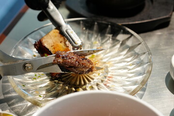 Korean BBQ with Raw Beef Short Ribs Grilled on Charcoal at Local Galbi Restaurant