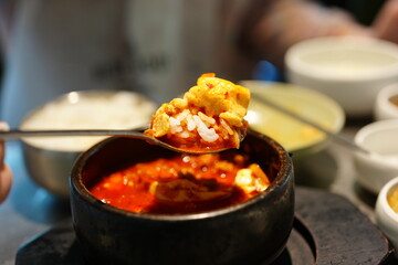 Korean BBQ with Raw Beef Short Ribs Grilled on Charcoal at Local Galbi Restaurant